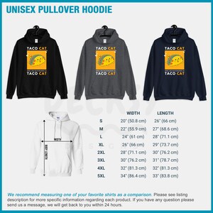 May include: A unisex pullover hoodie with a graphic of a cat eating a taco. The text on the graphic says "Taco Cat" and "Spelled Backwards is Taco Cat". The hoodie is available in black, gray, and navy blue. The size chart shows the width and length of the hoodie in inches and centimeters.