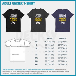 May include: A black, heather grey, and navy blue unisex t-shirt with the text "I speak fluent video games" and a video game controller graphic. The t-shirt is available in sizes XS to 4XL. The size chart shows the width and length of the t-shirt in inches and centimeters.