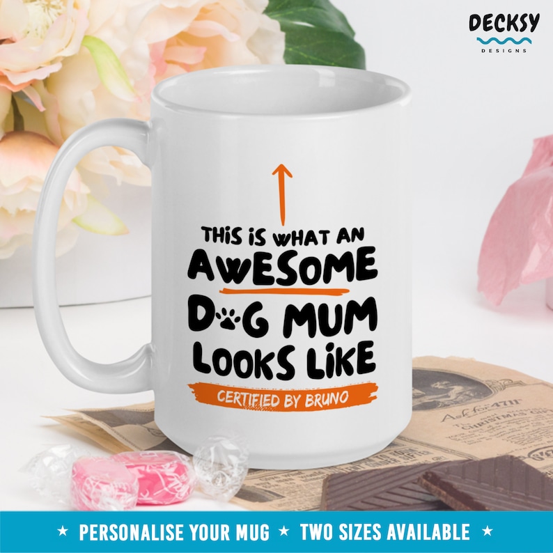 May include: White ceramic mug with a black and orange design that says "This is what an awesome dog mum looks like. Certified by Bruno."