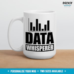 May include: White ceramic mug with a black graphic of a bar chart and the text "DATA WHISPERER".
