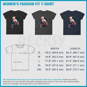 May include: A size chart for women's t-shirts with a graphic of a pink cockatoo riding a bicycle. The chart shows the width and length of the shirts in inches and centimeters for sizes S, M, L, XL, and 2XL.