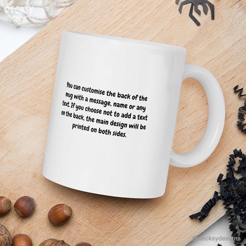 May include: White ceramic mug with a black handle. The mug has text that reads: "You can customize the back of the mug with a message, name or any text. If you choose not to add a text on the back, the main design will be printed on both sides."