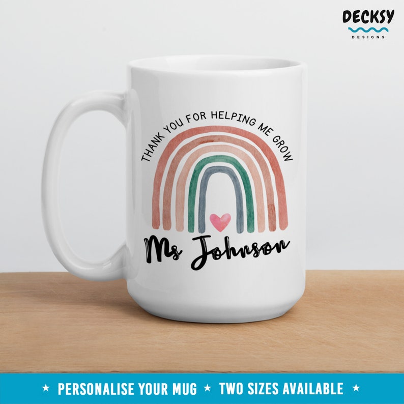 May include: White ceramic mug with a rainbow design and the text "Thank you for helping me grow" and "Ms Johnson".