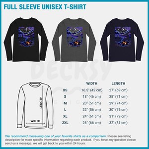 May include: A size chart for a long-sleeved unisex t-shirt with a graphic of a mountain scene with a campfire and a crescent moon. The chart shows the width and length measurements in inches and centimeters for sizes XS, S, M, L, XL, and 2XL.