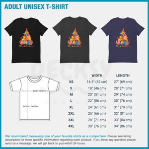May include: A black, gray, and blue unisex t-shirt with a Christmas tree design featuring cats. The text "Merry Christmas" is printed on the shirt. The shirt is available in sizes XS to 4XL. The size chart shows the width and length of the shirt in inches and centimeters.