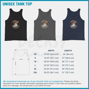 May include: Three unisex tank tops in black, gray, and navy blue. Each tank top features the text "LONG LIVE COWGHOULS" above a graphic of a ghost wearing a cowboy hat. The image also includes a size chart with measurements in inches and centimeters.