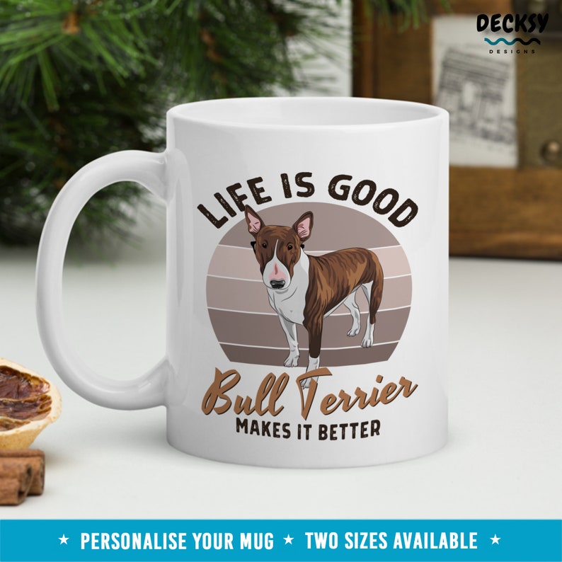 May include: White ceramic mug with a brown bull terrier illustration. The mug has the text "Life is good Bull Terrier makes it better" printed on it.