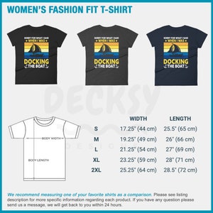 May include: A size chart for women's t-shirts with the text "Sorry for what I said when I was docking the boat" on a black, gray, and navy blue t-shirt. The size chart shows the width and length of the t-shirt in inches and centimeters.