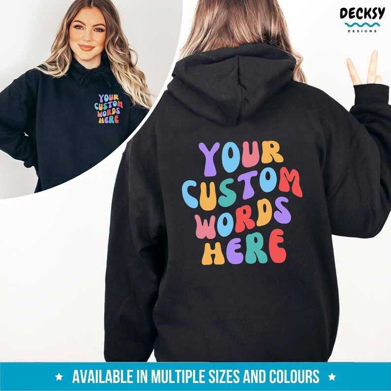 May include: Black hooded sweatshirt with the text "YOUR CUSTOM WORDS HERE" in colorful, rounded letters on the back.