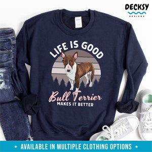 May include: A navy blue sweatshirt with a white and brown bull terrier dog graphic. The text "Life is good Bull Terrier makes it better" is printed on the sweatshirt.