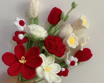 May include: A bouquet of crocheted flowers in shades of red and white. The bouquet includes tulips, roses, and daisies.