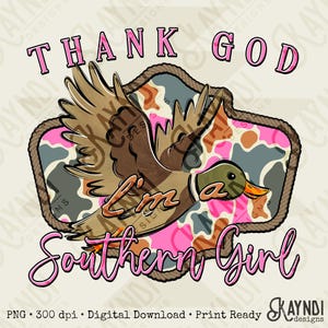 May include: A digital design featuring a flying duck with brown and tan feathers, a green head, and an orange beak. The duck is set against a pink and camouflage background, with the text "THANK GOD I'm a Southern Girl" in pink script.