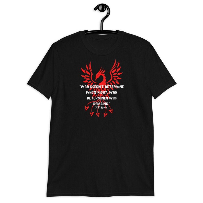 May include: Black t-shirt featuring a red phoenix graphic and the quote "WAR DOESN'T DETERMINE WHO'S RIGHT. WAR DETERMINES WHO REMAINS." by RE Kong.