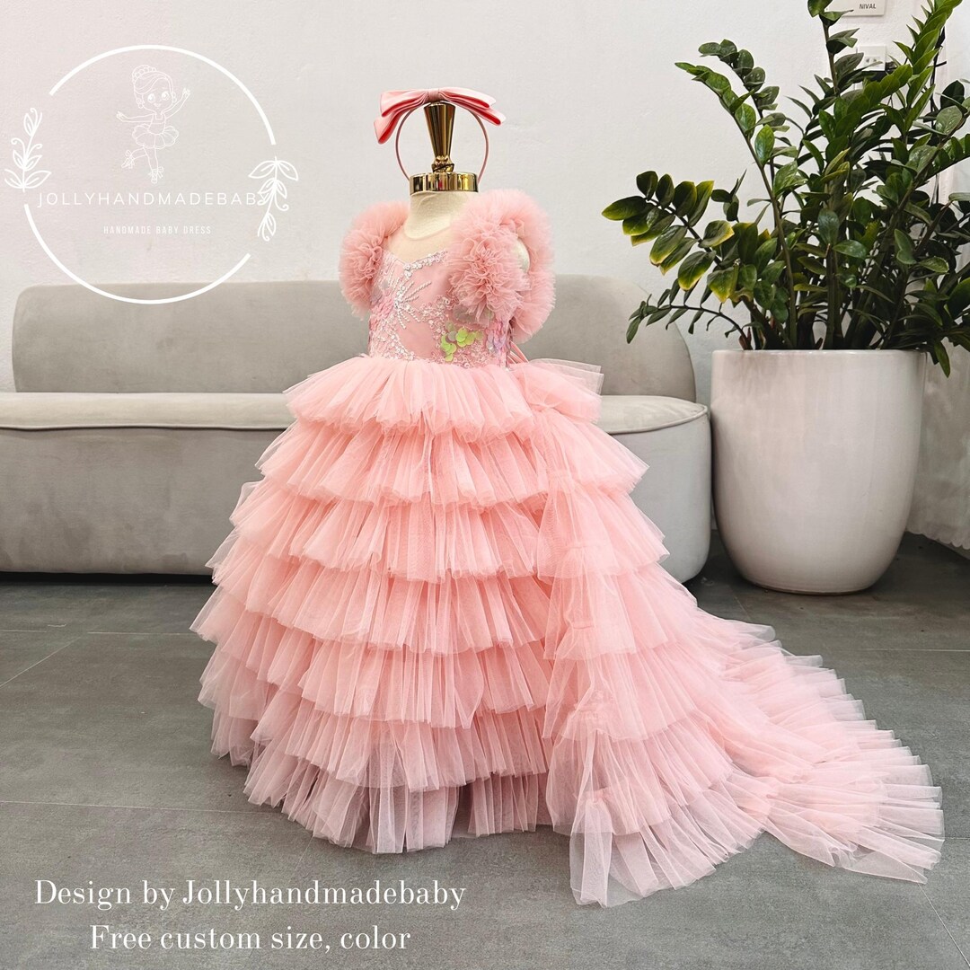 princess tiana pink dress Charlotte The gown is inspired by Charlotte, Tiana's charming and pink-loving best friend from The Princess and the Frog. Just like Charlotte's bubbly and glamorous personality, this dress captures a