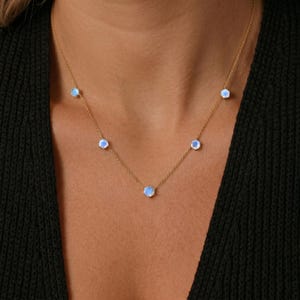 Dainty Moonstone minimalist layering necklace in sterling silver jewelry
Moonstone minimalist necklace for women simple elegant station chain design
Fine Moonstone minimalist chain station necklace anniversary gift for her
Minimalist Moonstone floating gemstone necklace delicate silver chain