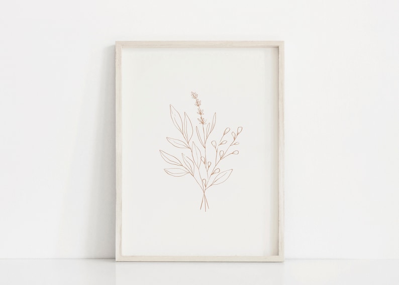 May include: A framed print with a minimalist line drawing of a bouquet of flowers in a light brown color on a white background.