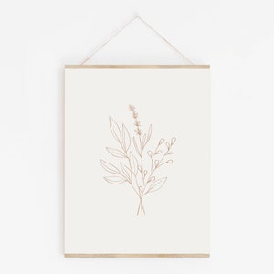 May include: A minimalist line drawing of a bouquet of flowers in brown on a white background. The print is framed and hanging on a white wall.