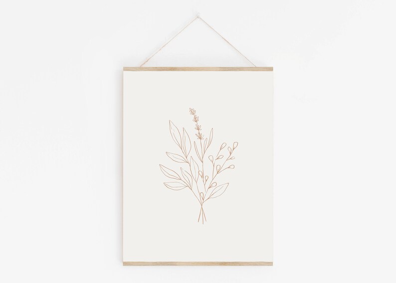 May include: A minimalist line drawing of a bouquet of flowers in brown on a white background. The print is framed and hanging on a white wall.