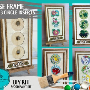 May include: A wooden DIY kit for creating a framed wall decor piece with three circular inserts. The kit includes a base frame, three circles, and a paint kit. The circles are blank and can be painted with the included paints to create a custom design. The frame is made of wood and has a rustic finish. The kit is perfect for adding a personal touch to any room.