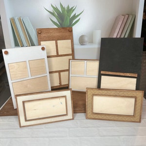 K&ouml;nnte beinhalten: Ein Set aus sechs Holzbilderrahmen in verschiedenen Gr&ouml;&szlig;en und Stilen. Die Rahmen sind alle aus Naturholz gefertigt und haben einen rustikalen Look. Einige Rahmen haben ein schlichtes Design, w&auml;hrend andere kompliziertere Details aufweisen. Die Rahmen sind auf einer wei&szlig;en Ziegelstein-Oberfl&auml;che angeordnet.