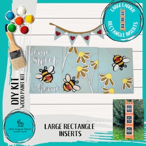 May include: DIY wood paint kit with three rectangular panels featuring a bee and flower design, a banner with hearts, and the words "home sweet home". The kit includes paint and instructions.