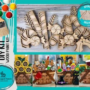 May include: DIY wood paint kit featuring a basket with candy canes, a bow, and a swirl design. The kit includes a paintbrush and paint pots. The text "DIY KIT WOOD PAINT KIT" is on the left side of the image. The text "Little August Ranch Handmade in the USA" is on the bottom left of the image. The text "BASKET INSERT" is on the right side of the image.