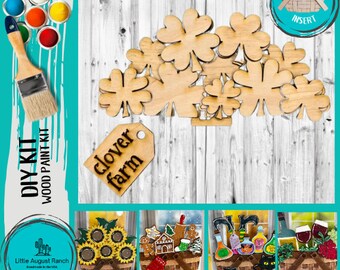 May include: DIY wood craft kit featuring a clover farm design. The kit includes a wooden sign with the words "clover farm" and multiple wooden clover shapes. The kit also includes a paint brush and a set of paint colors.