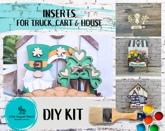 May include: DIY kit for a truck, cart, and house with a gnome, shamrock, and flower market theme. The kit includes wooden cutouts, paint, and a paintbrush.