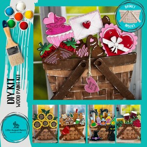 May include: DIY wood paint kit featuring a basket filled with Valentine's Day themed decorations, including a cupcake, chocolate, strawberries, and a heart-shaped sign that says "Sweetness for my Sweetheart".