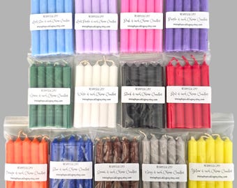May include: Thirteen clear plastic bags, each containing four 4-inch chime candles in distinct colors: light blue, light purple, pink, purple, green, white, black, red, orange, blue, brown, gray, and yellow. Each bag has a label with the text Metaphysical Gypsy.