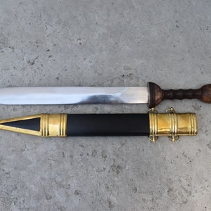 Gladius Roman Sword of the Roman Legionaries With Replica Carbon Steel Sword with Wood Handle Hard Scabbard Included.