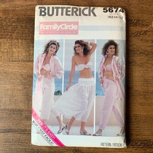 May include: A vintage Butterick sewing pattern, Family Circle, featuring three women modeling a matching lingerie set. The pattern includes a bra, high-waisted pants, and a jacket. The text "YES! IT'S EASY! QUI! C'EST FACILE!" is visible.