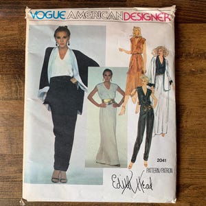 May include: Vogue American Designer sewing pattern 2041 by Edith Head. The envelope features illustrations of various outfits including a black jacket, white top, dark trousers, a long dress, and a jumpsuit. The text includes the brand and pattern number.