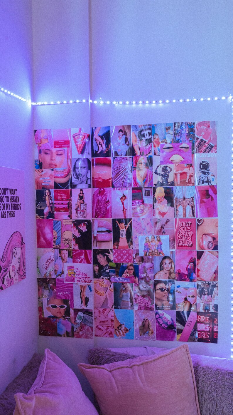 May include: A pink and white collage of images featuring celebrities, fashion, and pop culture icons. The collage is mounted on a wall with a string of white LED lights above it. The collage is in a room with pink pillows and a fuzzy rug.