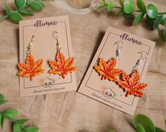 Handmade polymer clay earrings in the shape of autumn leaves