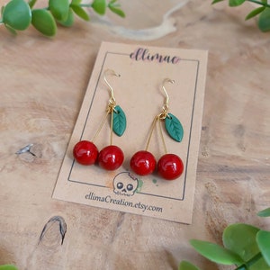 Handmade cherry and small green leaf dangling earrings in polymer clay image 3