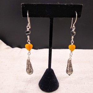 Boucles d’oreilles double coeur