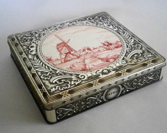 Vintage Dutch 1960s Patria Cream Crackers Tin Box Silver With A Light Pink Image Depicting A Dutch Mill And Landscape