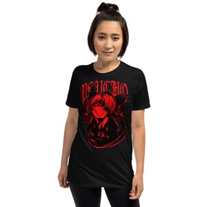 May include: Black t-shirt with a red graphic print of an anime character with cat ears and the word "PSYCHO" in red gothic lettering.