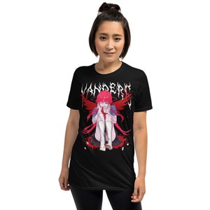 May include: Black t-shirt with a graphic print of an anime character with red hair and wings. The text "VANDERO" is printed in white above the character.