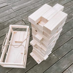 Giant tumble tower XXL – outdoor yard game for adults & kids – wedding, party, family fun – 54 jumbo wooden blocks + storage box and base