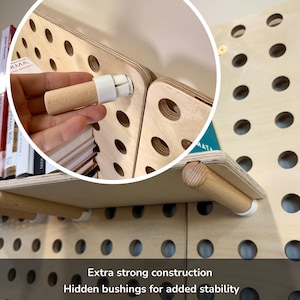 May include: A set of three ceramic mugs with a speckled, matte finish. Each mug is a different colour: light blue, cream, and grey. The mugs have a simple, modern design, ideal for coffee or tea.