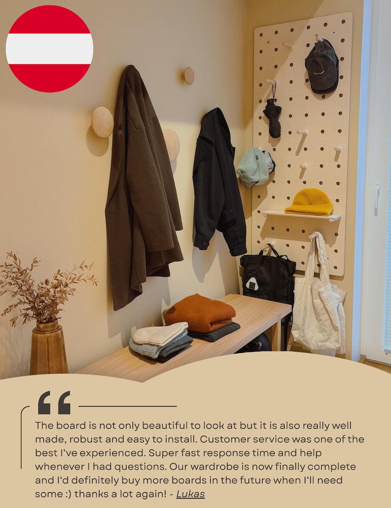 May include: A light-colored wooden pegboard mounted on a wall, featuring multiple pegs and a small shelf. The board holds a black cap, a black umbrella, a light blue hat, a yellow beanie, a black backpack, and a white tote bag.