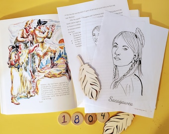 May include: A black and white illustration of Sacagawea, a Native American woman, with a feather in her hair. The illustration is on a white sheet of paper with the word "Sacagawea" printed below it. There are also wooden numbers 1, 8, 0, and 4 in the image.