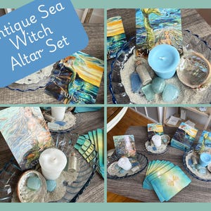 May include: An altar set featuring a glass dish filled with sand, a light blue candle, an abalone shell, polished blue stones, a small glass vial, and illustrated cards depicting mermaids with the text Waiting, Accepting, and Finding.