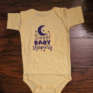 Girls bodysuit  12month size.