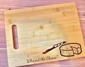 Who Cut the Cheese bamboo cutting board. Laser engraved.