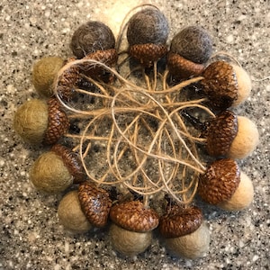 5 felted acorn ornaments.