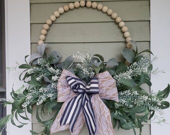 Wood bead front door wreath with lambs ear.