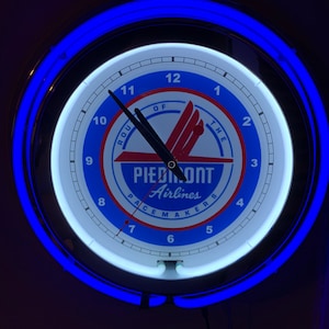 Piedmont Airlines Airplane Pilot Airport Terminal Stewardess Bar BLUE Neon Retro Wall Clock Advertising Man Cave Sign
